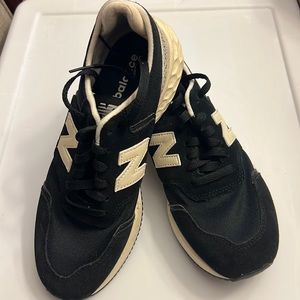 Women’s New Balance X70 in black/beige. Size 7.5. In great condition!